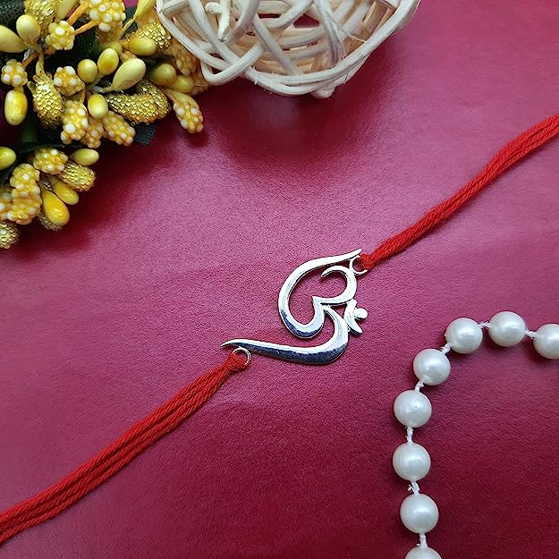 Religious Silver Plated OM Crystals Rakhi